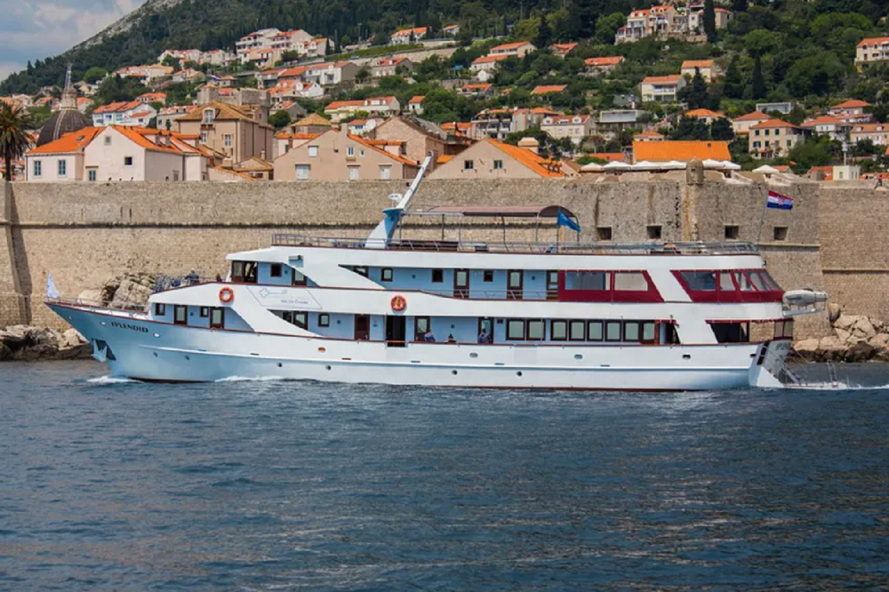 Passengers enjoying a beach stop during a mini one way cruise Croatia journey