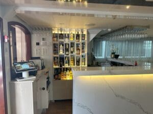 a bar with bottles of alcohol