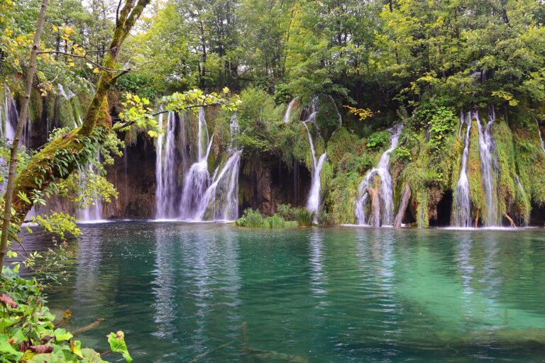 Waterfall and turquoise water in Plitvice Lakes National Park