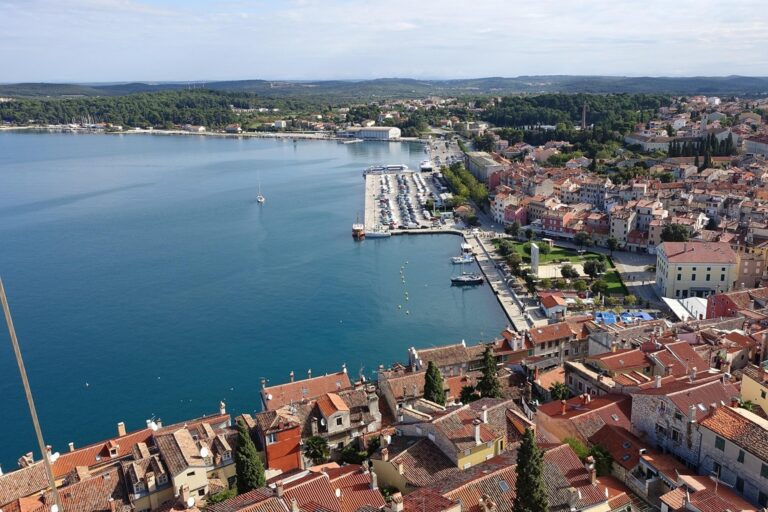 Croatian seaside town harbour with boats and waterfront