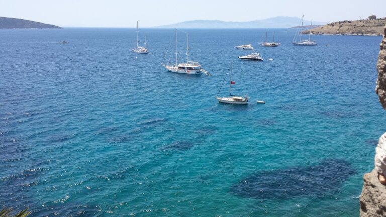 Yachts moored on clear blue water off Bodrum, Turkey